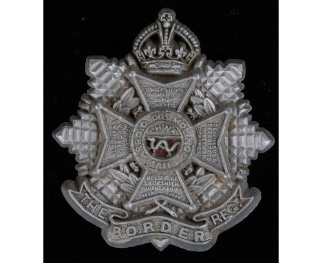 World War Two plastic economy cap badge to the Border Regiment, in silver grey, two blades to the reverse, marked 1 - A and A