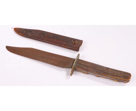 Early 20th Century Bowie knife, with a steel blade and antler grip and the original leather scabbard, 29cm long 