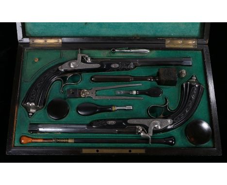 Fine cased pair of French percussion duelling pistols, Unsigned, mid 19th Century, with blue finish barrels, the ebony stock 