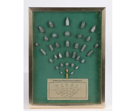 A framed collection of , ' Bullets that shaped American History', cast in the original moulds, the lead bullets include, .577