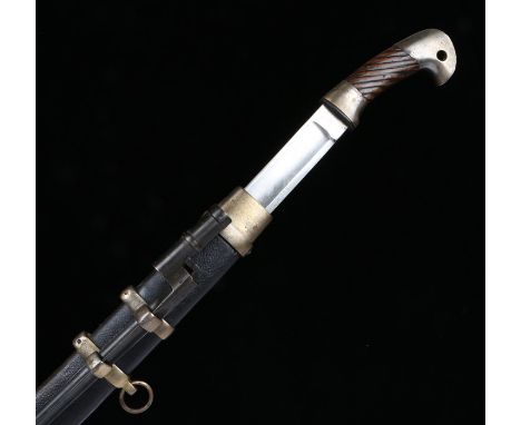 Russian cavalry Shashka and bayonet, fullered blade, with wooden grip and curved white metal pommel pierced to take sword kno