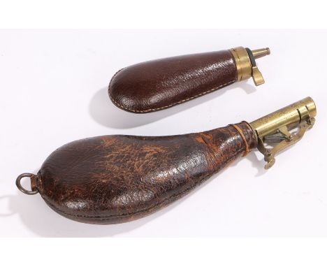 Two Victorian powder flasks, a leather covered pear shaped shot flask with brass charger and embossed with hunting dogs and a