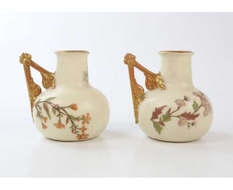ROYAL WORCESTER; a pair of 1138 pattern blush ivory vases, height 9cm.