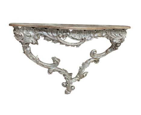 A modern silver serpentine fronted console table, width 114cm. 