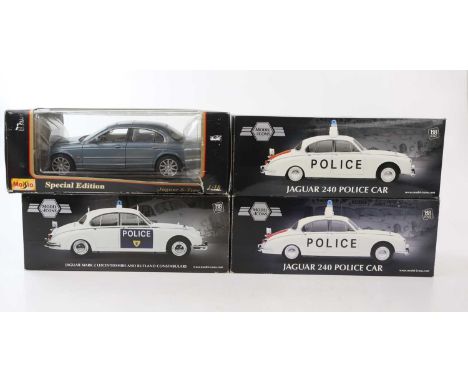 Four diecast model cars including a Jaguar S Type, two Model Icons Jaguar 240 police cars and a Jaguar Mk II Leicestershire a