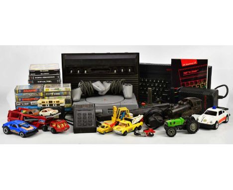 A group of mixed vintage games and game consoles to include Atari, together with three cartridges, Game Program Combat, Robot