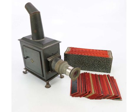 BING; a vintage metal magic lantern and assorted slides. 