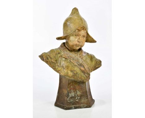 IN THE MANNER OF GOLDSCHEIDER; a glazed pottery bust of a young Dutch girl, indistinctly inscribed and signed to base, height