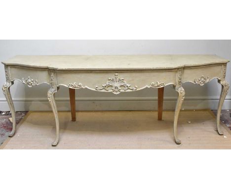 A reproduction painted carved wood serpentine fronted console table on four front carved cabriole supports, width 270cm, dept