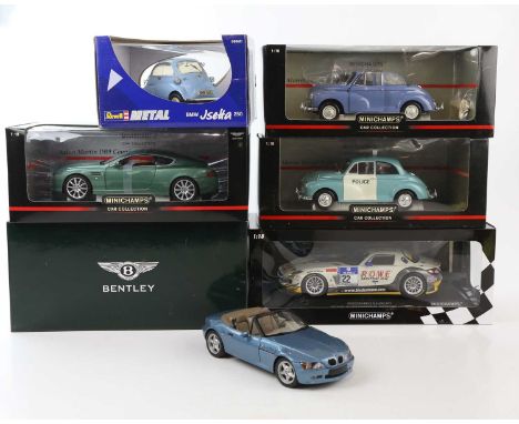 A collection of diecast model cars including a Revell BMW Isetta 250, Morris Minor, Morris Minor police car, Bentley, Jaguar,