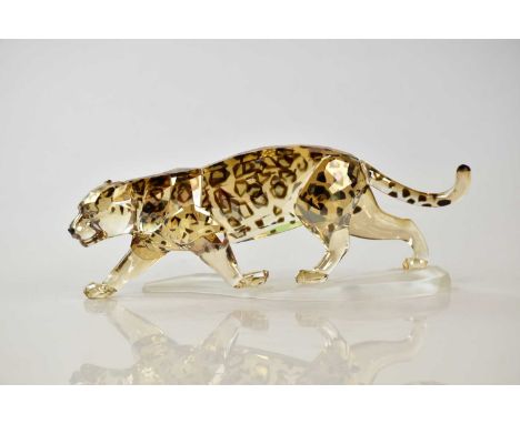 SWAROVSKI; a model of a Jaguar number 1096797, length 16cm, with certificate and box.Condition Report: Presented well in good