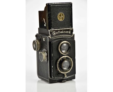 ROLLEICORD; a Rolleicord Model 2 TLR camera, serial No 1800518, with a Triotar 75m f3.5 lens, serial No 3302312, with a carry