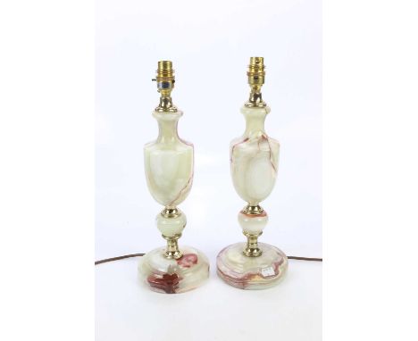 A pair of onyx table lamps, height including fitting 42cm.Condition Report: The item or items in this lot are sold as decorat