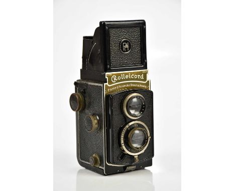 ROLLEICORD; a Rolleicord Model 1 TLR camera, serial No 1704919, with a Triotar 75mm f3.8 lens, with a carry case