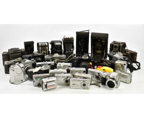 A collection of film and digital cameras, to include a Pentax Optio 50, Panasonic Lumix, a HP Photosmart, a Sony Cybershot, a