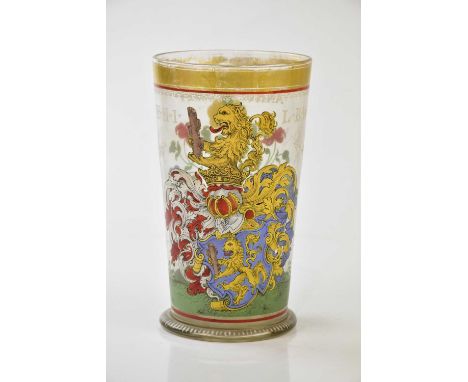 A 19th century free-blown armorial glass beaker with enamel and gilded decoration, height 16.5cm. Condition Report: Wear to t
