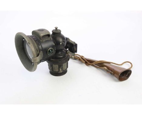 A Lucas 'King of the Road' bicycle lamp and a Les Fils de J Tournier hunting horn (2).