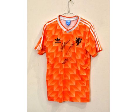 NETHERLANDS; a 1988 retro style football shirt, signed to front by Rijkaard, Gullit and van Basten.Condition Report: Light cr