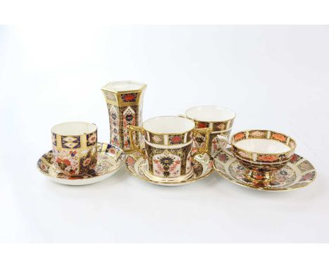 A collection of assorted ceramics including a hexagonal vase, loving cup, two teacups and saucers, also an Imari teacup and s