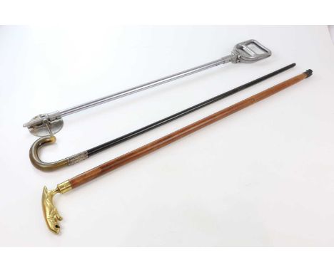 A silver mounted ebonized walking cane, the silver collar engraved ‘St Peter Dramatic Society to J. W. Tuttle 1913, length 90