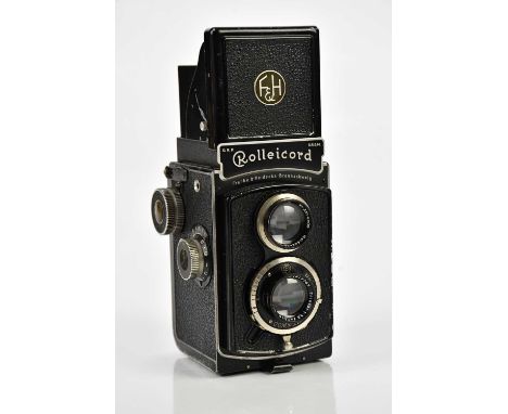 ROLLEICORD; a Rolleicord Model 2 TLR camera, serial No 1813262, with a Triotar 75mm f3..5, serial No 3314909, with a carry ca