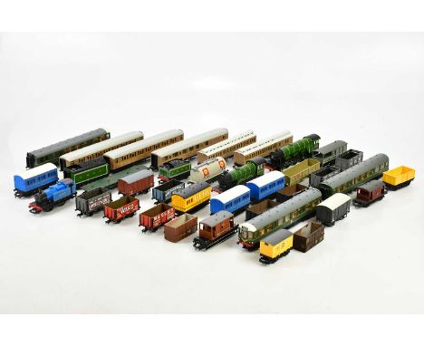 A mixed collection of Hornby and Bachmann OO carriages and tenders.