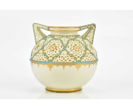 GRAINGER &amp; CO, WORCESTER; a part reticulated twin handled vase with turquoise jewelled and gilt applied detail, impressed