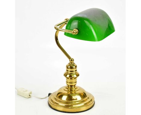 A vintage brass desk lamp with green enamel glass shade, height 36cm.Condition Report: The item or items in this lot are sold