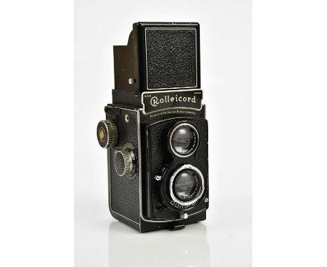 ROLLEICORD; a Rolleicord Model II TLR camera, serial No 1973082, with a Triotar 75mm f3.5 lens, serial No 547586, with a carr