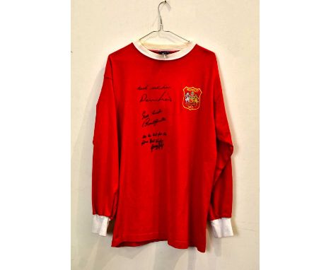 MANCHESTER UNITED; a signed 1963 retro style football shirt, signed to front by Best, Law and Charlton, size L.Condition Repo