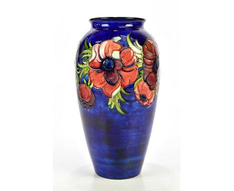 MOORCROFT; a large vase of shouldered form decorated in the 'Anemone' pattern on a blue ground, impressed marks and blue sign