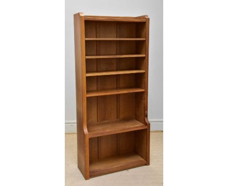 WORKSHOP OF ROBERT MOUSEMAN THOMPSON; an oak freestand waterfall bookcase, with five shelves, width 84cm, depth 33cm, height 