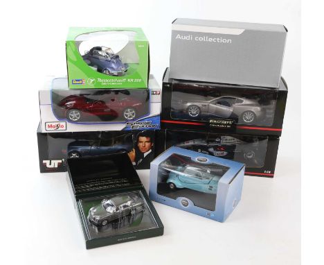 A collection of diecast model cars including an Audi TT Coupé, Bentley Arnage, BMW bubble car, GoldenEye BMW Z3 Roadster, 201
