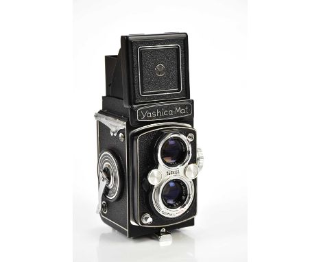 YASHICA; a Yashica-Mat TLR camera, serial No MT 7010388, with a Yasinin 80mm f3.2 lens, serial No 676548, with manual  and or