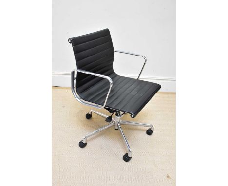 AFTER CHARLES &amp; RAY EAMES; a contemporary Vitra chrome and black leather swivel office chair.Condition Report: The chair 