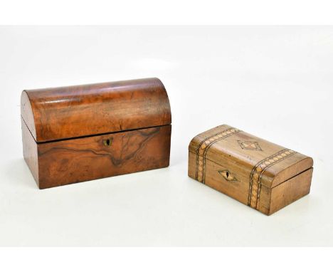 A Victorian walnut dome topped tea caddy, the hinged cover enclosing mixing bowl and two compartments, width 27cm, and a Vict
