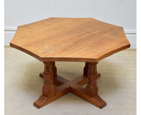 WORKSHOP OF ROBERT MOUSEMAN THOMPSON; an usual octagonal table on four baluster shaped columns, width 83cm, height 48cm.