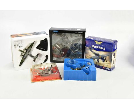 A group of four diecast model planes comprising an Aviation Archive Stuka, a Heinkel 177, a P51 Mustang and a War Master Hein