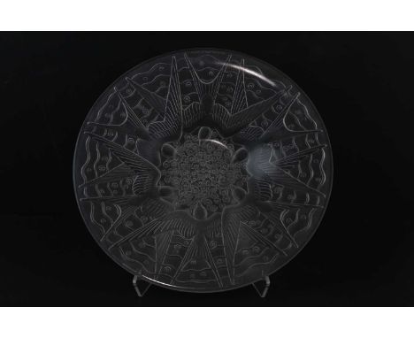 PIERRE D'AVESN; a French Art Deco frosted glass charger, decorated with swallows, embossed signature, diameter 35.5cm.Conditi
