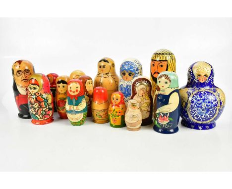 A collection of vintage Russian dolls, including a globular example baring signature to the under side (15).