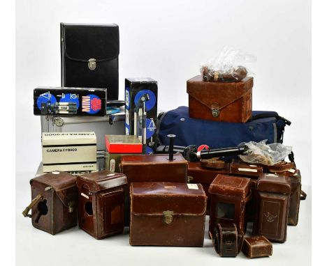 A collection of camera accessories, to include Rollei leather carry cases, a Hasselblad leather carry case, a Samsung AF Slim