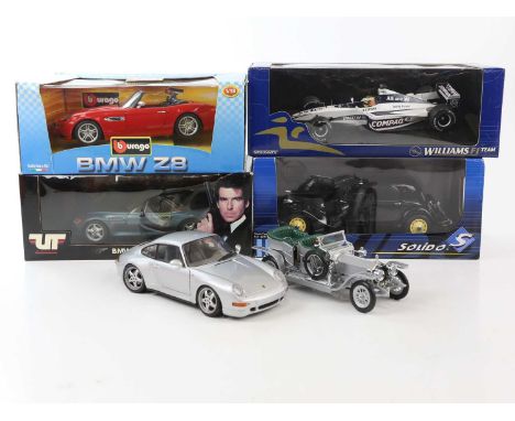 A collection of diecast model vehicles including a Burago BMW Z8, a GoldenEye BMW Z3 Roadster, a Porsche 911, Rolls-Royce Sil
