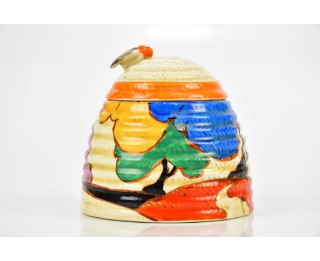 CLARICE CLIFF; a Fantastique Beehive honeypot and cover in the 'Blue Autumn' pattern, height 9cm.Condition Report: Chip to th