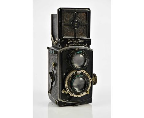 ROLLEIFLEX; a Rolleiflex Baby 4x4 TLR camera, model 4RF, serial No 157669, with a Tessar 60mm f2.8 lens, with carry case