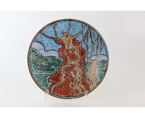 TONY MORRIS FOR POOLE STUDIO POTTERY; a ceramic wall charger decorated with stylised trees, printed marks and signature, diam