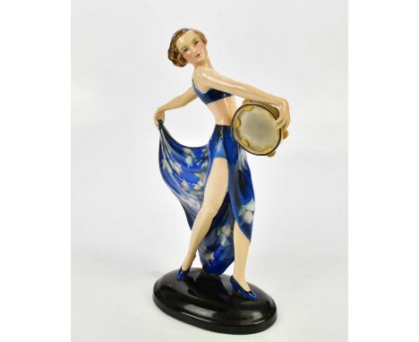 JOSEF LORENZL (1892-1950) FOR GOLDSCHEIDER; an Art Deco figure, tambourine dancer with blue floral dress, impressed markings 