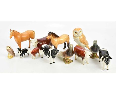 BESWICK; a collection of ceramic figures including barn owl, cows, pigeons, horses, etc.Condition Report: Crazing, surface we