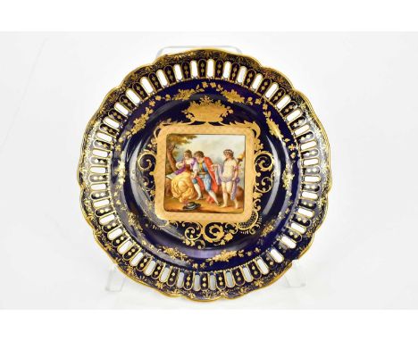 VIENNA; a fine late 19th century ribbon plate, the outer border with gilt swags, bows and floral detail surrounding the centr
