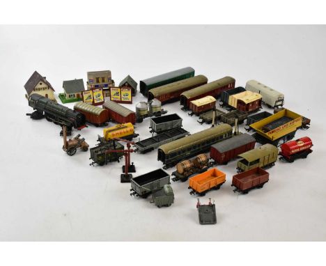 A collection of OO gauge carriages and tendens to include Pocher and Marklin examples.