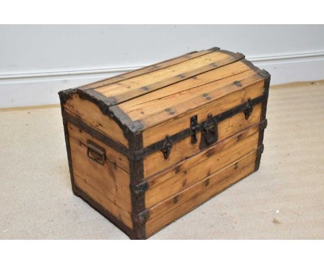 An old pine metal bound dome top trunk, width 69cm.